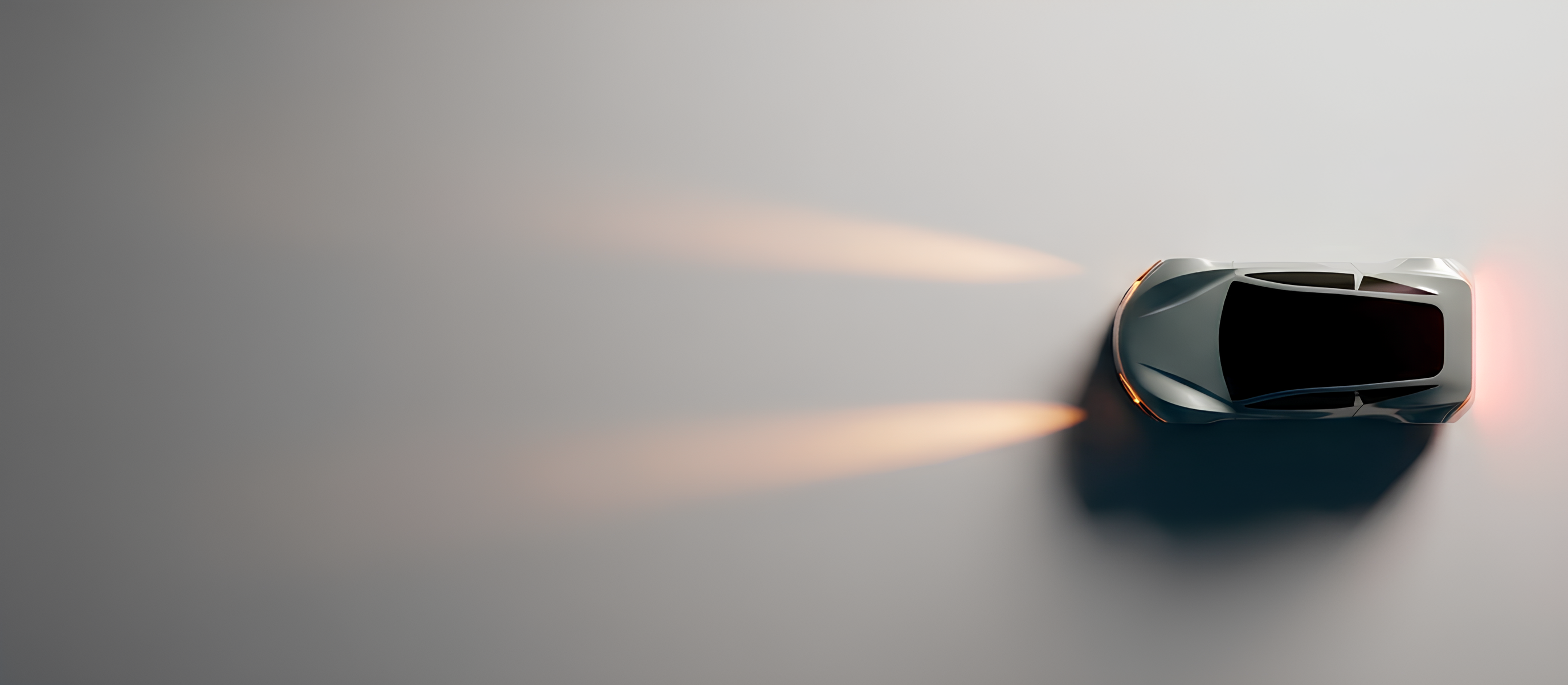 Carro com faróis acesos visto de cima